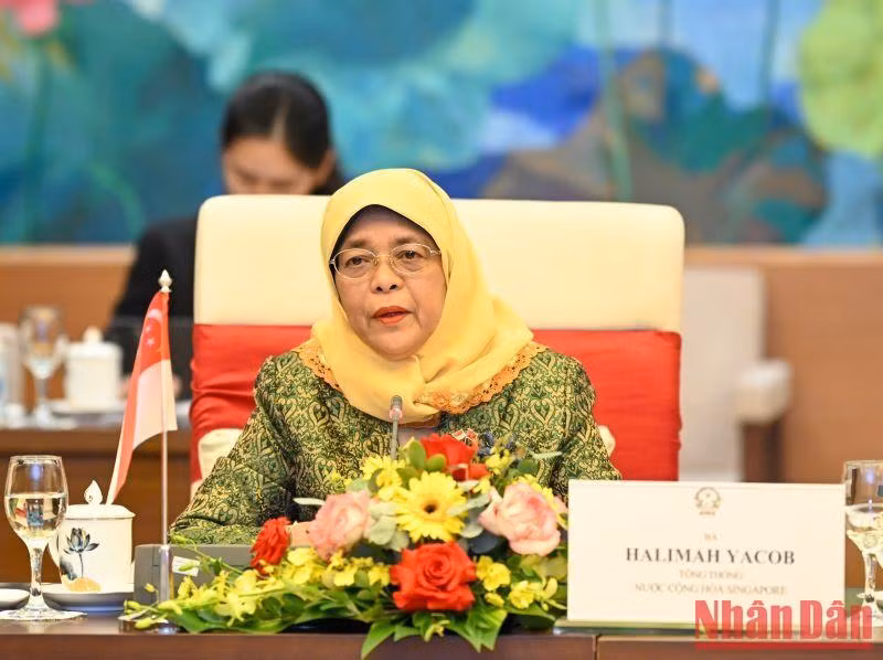 Singaporean President Halimah Yacob speaks at the reception.