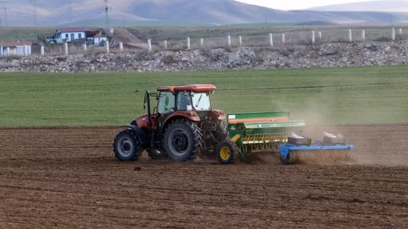 A farmer operates agricultural machinery on a field in Ankara, Turkey, on April 23, 2024. (Photo: XINHUA)