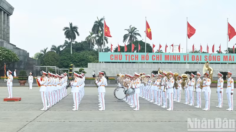 At Ba Dinh Square, the military band performs ceremonial honours as part of the event.