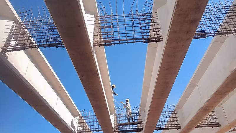The contractor works on the bridge section of the North-South Expressway.