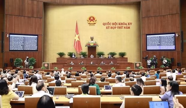 At a NA working session. (Photo: VNA)