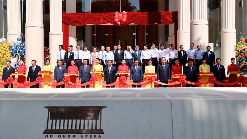 PM Pham Minh Chinh (front, centre) and officials cut the ribbon to open the Ho Guom Opera in Hanoi on July 9. (Photo: Nam Nguyen)