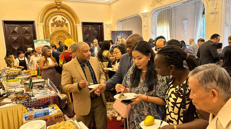 Various dishes of African cuisine are introduced at the celebration. (Photo: KIM LINH)