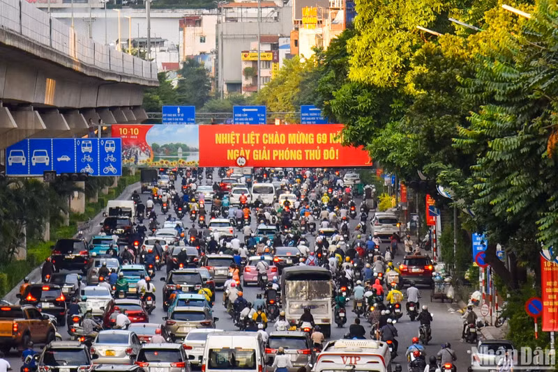 The image of Nguyen Trai Street with the dominant red colour of the large-sized posters. The image of Nguyen Trai Street with the dominant red colour of the large-sized posters.