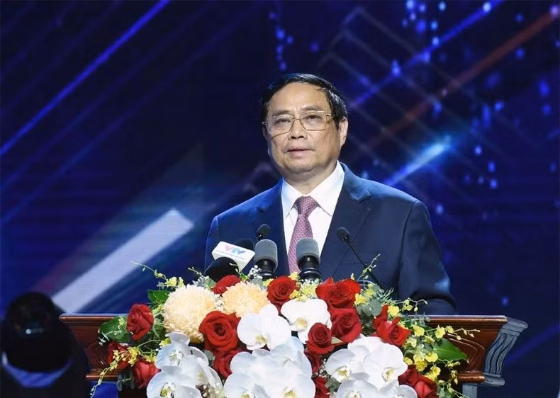 PM Pham Minh Chinh addresses the programme in Hanoi on June 14. (Photo: NDO)