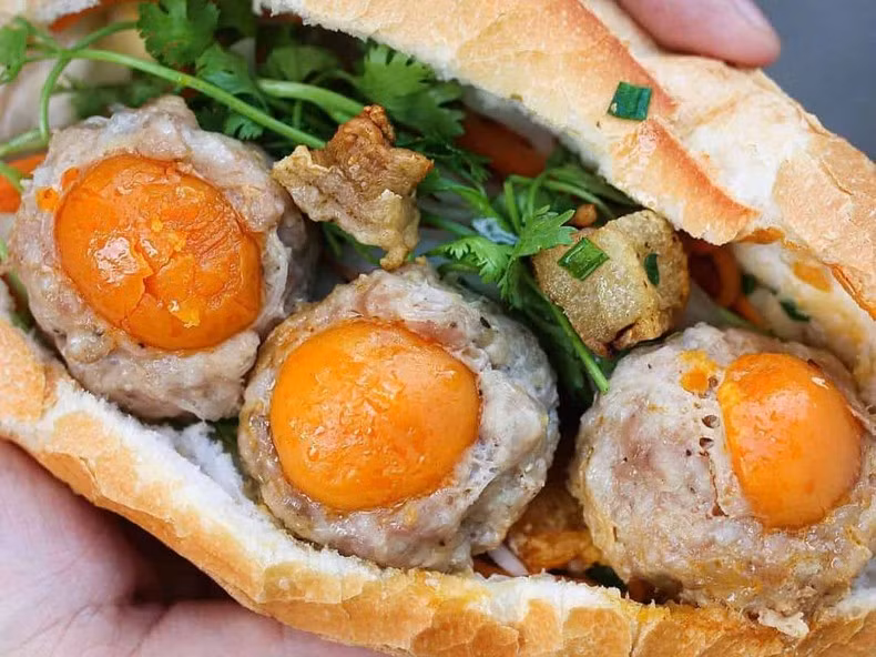 Ho Chi Minh City is famous for 'banh mi xiu mai trung muoi'. Ho Chi Minh City is famous for 'banh mi xiu mai trung muoi'.