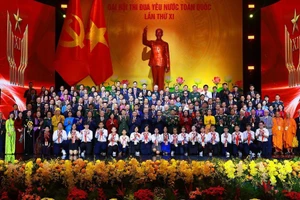 Party General Secretary To Lam, State President Luong Cuong, and Prime Minister Pham Minh Chinh, along with delegates at the 11th National Patriotic Emulation Congress. (Photo: VNA)