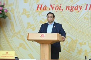 Prime Minister Pham Minh Chinh delivering his speech at the meeting.