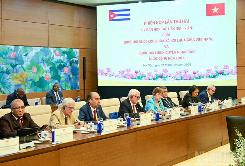 Cuban National Assembly delegates attend the meeting. 011025-vn-cuba-5.jpg