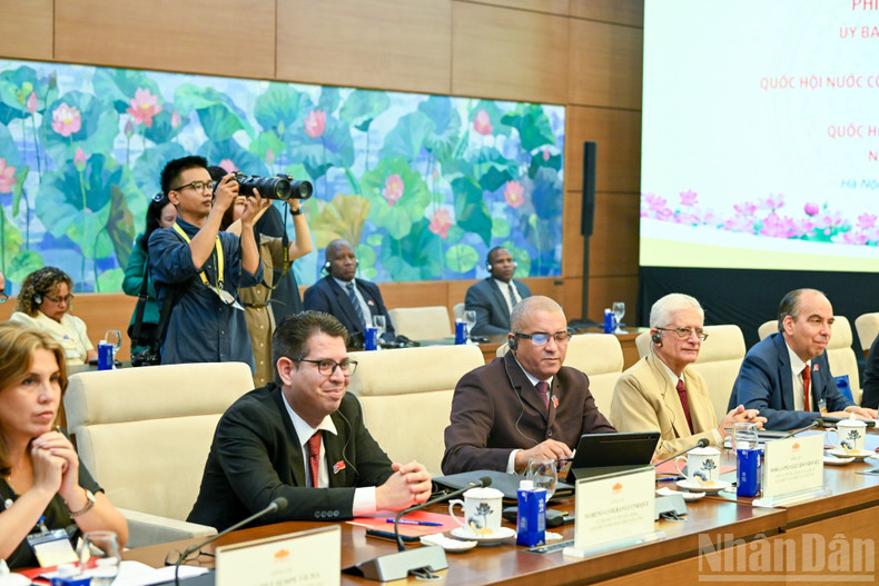 Cuban National Assembly delegates attend the meeting. 011025-vn-cuba-8.jpg