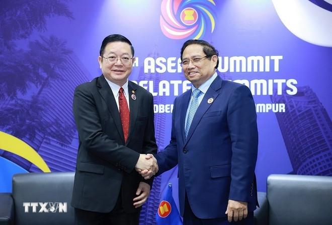 PM Pham Minh Chinh and ASEAN Secretary-General Kao Kim Hourn (Photo: VNA) 261025-tt-gap-2.jpg