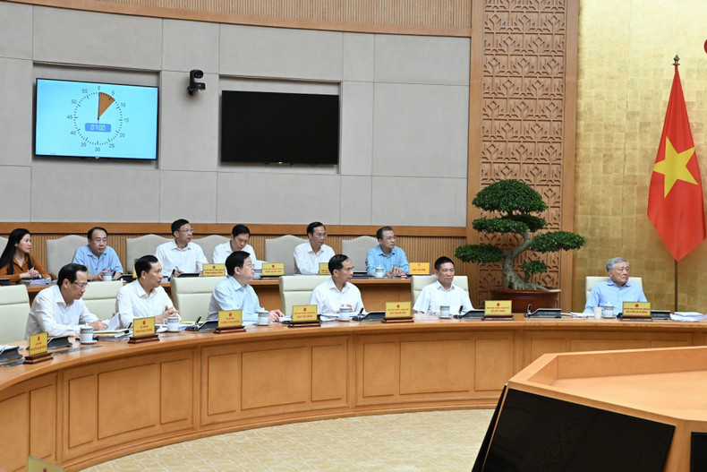 Government members and delegates attend the meeting. 060925-hop-3.jpg