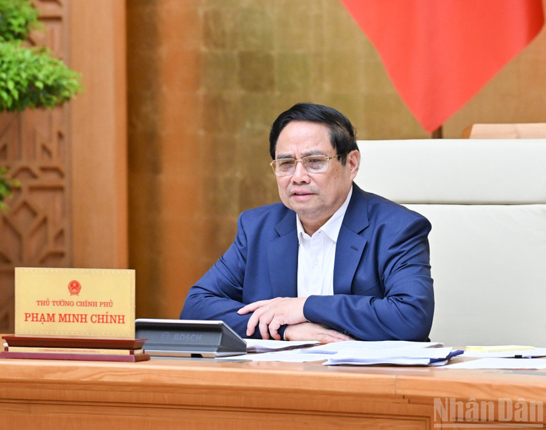 Prime Minister Pham Minh Chinh chairs the July Government session on law-making. 230725-xd-luat-3.jpg