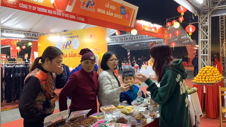 Visitors at display booth.