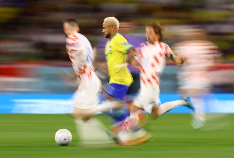 Brazil's Neymar in action with Croatia's Luka Modric. REUTERS/Hannah Mckay