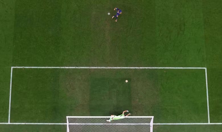 France's Kylian Mbappe scores their first goal from the penalty spot. REUTERS/Carl Recine