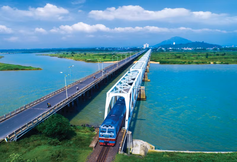 A train on Vietnam's conventional railway.