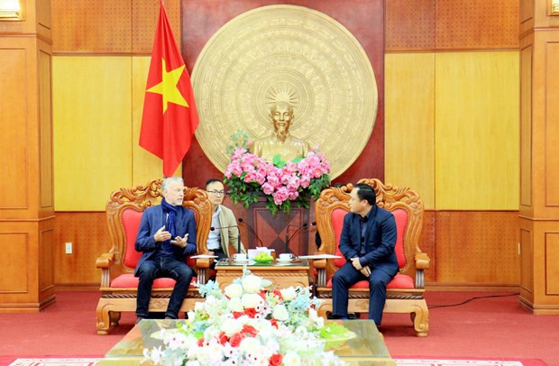 At the working session (Photo: VNA)