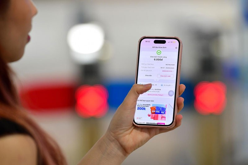 MoMo is the first fintech app to support buying metro tickets by scanning QR codes or making payment through the HCMC Metro app.