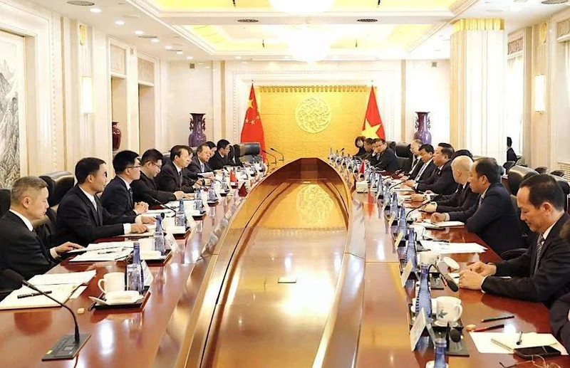 At the meeting between Minister of Construction Tran Hong Minh and Chinese Minister of Transport Liu Wei (Photo: Ministry of Construction)
