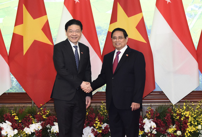 Prime Minister Pham Minh Chinh and Singaporean Prime Minister Lawrence Wong. (Photo: Tran Hai)