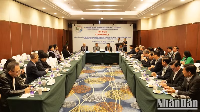 Representatives from agencies and businesses attend the conference in Beijing. (Photo: NDO)