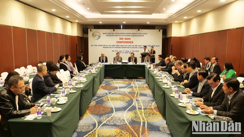 Representatives from agencies and businesses attend the conference in Beijing. (Photo: NDO)