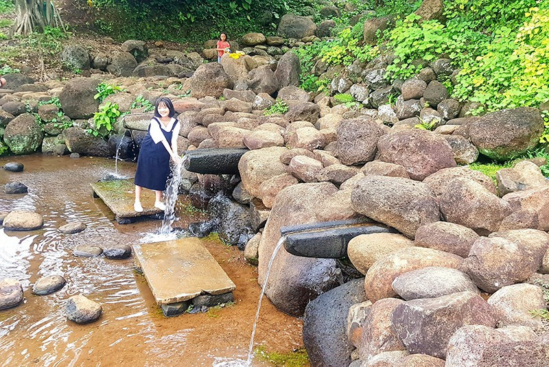 Water from an ancient well was distributed out through rock troughs for daily use.