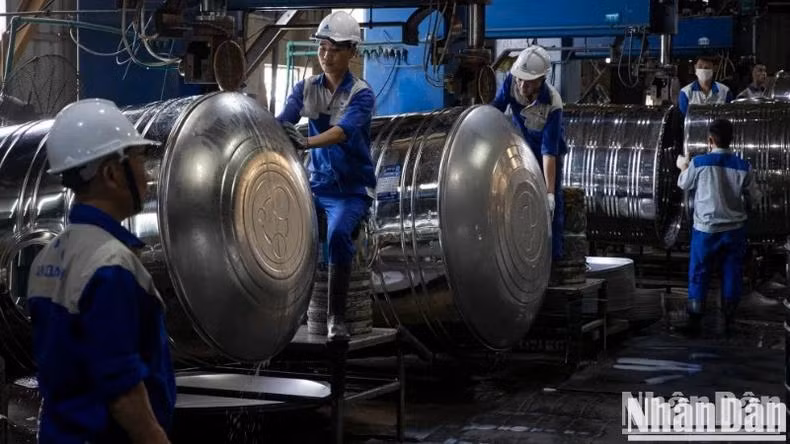 Workers at Tan A Dai Thanh, a private company specialising in water solutions. Workers at Tan A Dai Thanh, a private company specialising in water solutions.
