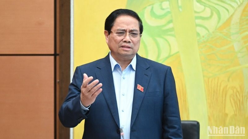 PM Pham Minh Chinh speaks at the group discussion on May 23. (Photo: Bui Giang)