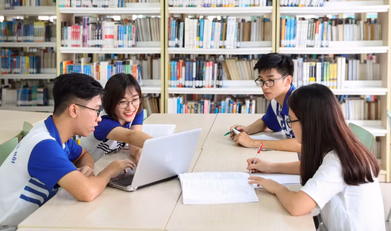 Students in the library of the Vietnam National University Hanoi.