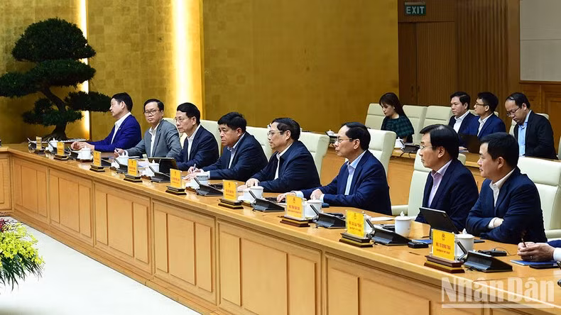 Prime Minister Pham Minh Chinh and members of the Vietnamese delegation at the event.