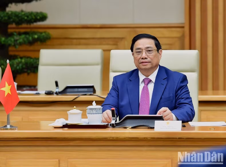 Prime Minister Pham Minh Chinh speaks at the talks with his Belarusian counterpart Roman Golovchenko.