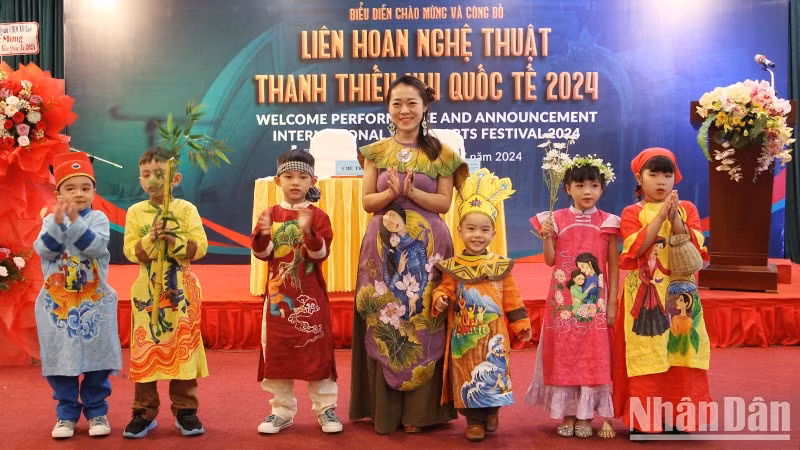 Children perform at the announcement of the international youth arts festival.
