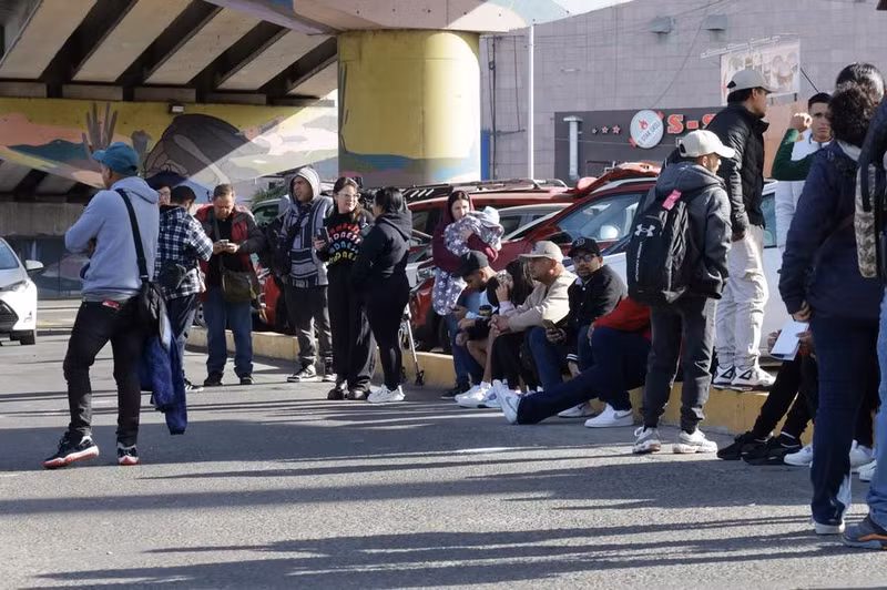 Migrants wait at the Chaparral checkpoint in Tijuana, Mexico. (Photo: Xinhua)