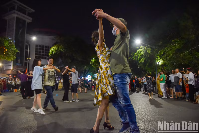 Visitors dance to the tune of classical music.