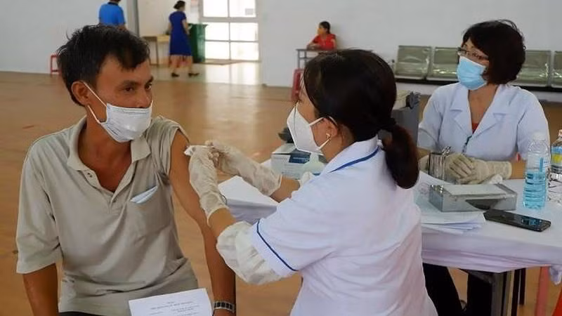 A man is vaccinated against COVID-19.
