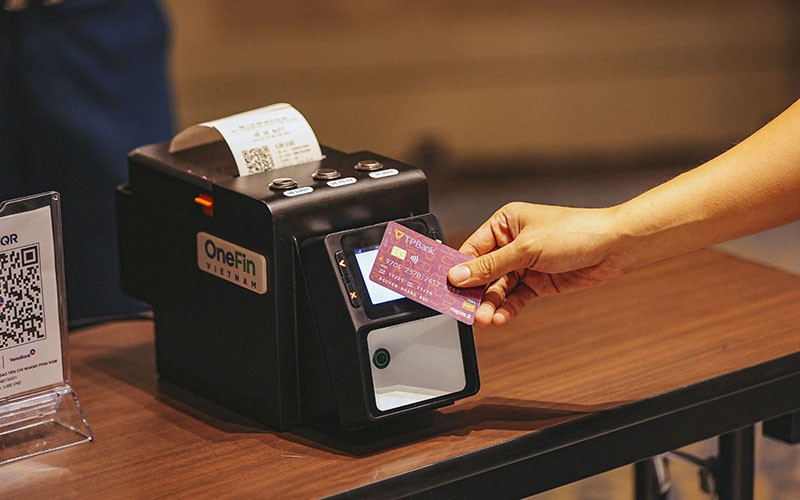 Paying with a bank card.