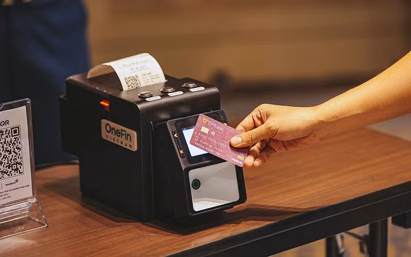 Paying with a bank card.