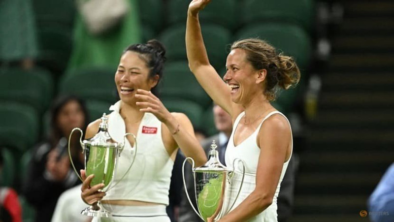 Taiwan's Hsieh Su-wei and Czech Republic's Barbora Strycova celebrate with their trophies after winning the women's doubles final against Belgium's Elise Mertens and Australia's Storm Hunter. (Photo: Reuters)