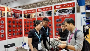 Buyers seek suppliers of globally standardised equipment at Automechanika, opened in Ho Chi Minh City on June 19. (Photo: VNA)