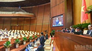 An overview of the Q&A session during the 9th sitting of the 15th NA. (Photo: DUY LINH)