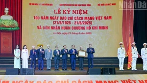 Party General Secretary To Lam presents Ho Chi Minh Order to Viet Nam revolutionary press.