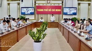 The working session between the Ho Chi Minh City People’s Committee and relevant departments, agencies and localities on February 28 (Photo: VNA) 
