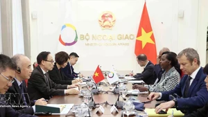 At the talks between Politburo member and Minister of Foreign Affairs Le Hoai Trung and Secretary-General of the International Organisation of La Francophonie (OIF) Louise Mushikiwabo in Ha Noi on March 6. (Photo: VNA) 