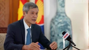 Vietnamese Ambassador to Cambodia Nguyen Minh Vu speaks to the Nhan Dan correspondent in Cambodia. (Photo: DINH TRUONG)