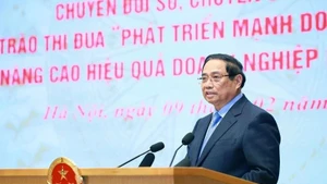 Prime Minister Pham Minh Chinh speaks at the ceremony on February 9 to launch two key emulation movements aimed at swiftly translating the Resolution of the 14th National Party Congress into practice. (Photo: VNA)