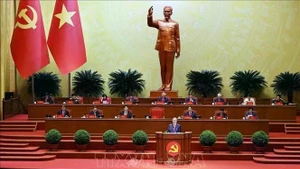 Party General Secretary To Lam delivers the 13th Party Central Committee's report on the documents submitted to the 14th National Party Congress on January 20 morning. (Photo: VNA)