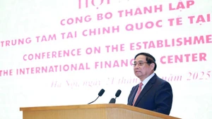 PM Pham Minh Chinh addresses the conference on the establishment of the International Financial Centre (IFC) in Viet Nam on December 21. (Photo: VNA)