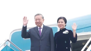 Party General Secretary To Lam and his spouse leave Ha Noi on December 1 for a state visit to Laos. (Photo: VNA)